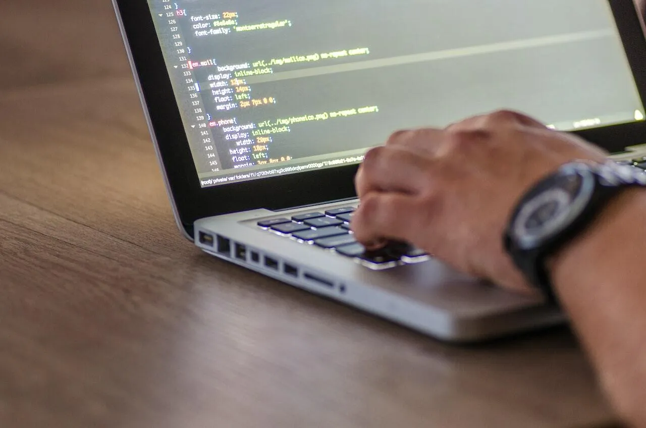 Close up of someone writing code