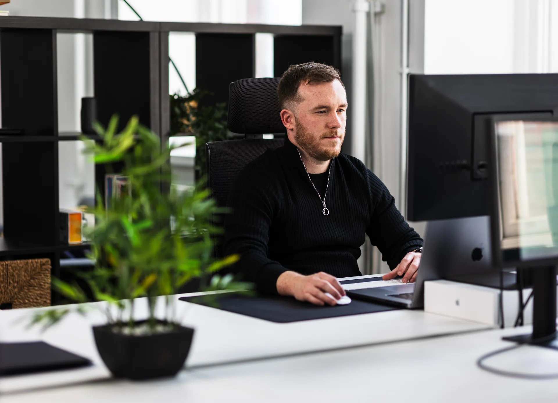 Myth Digital team collaborating on a healthcare software project in their UK office