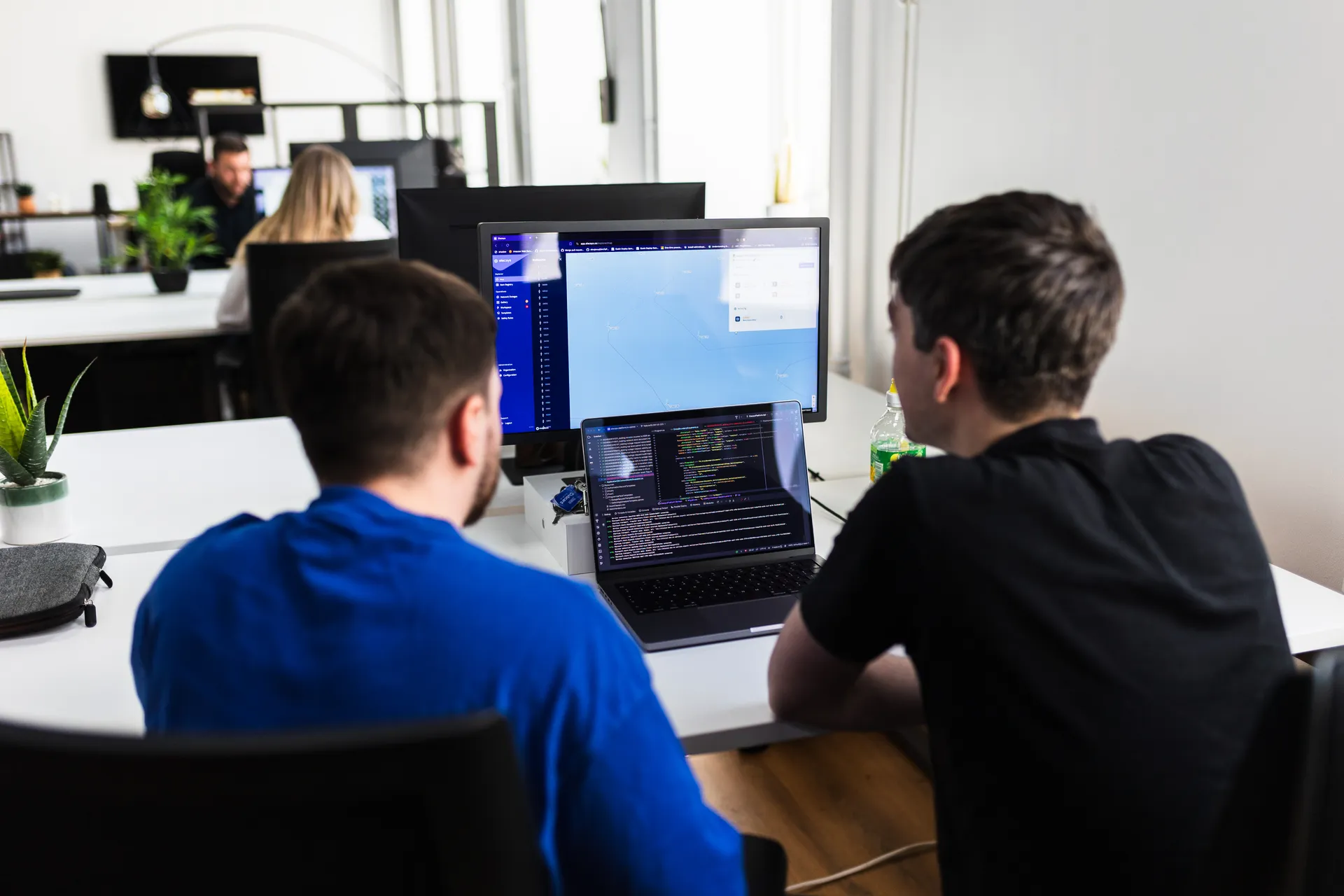 Myth Digital's senior in-house team collaborating at their Shoreditch office in London