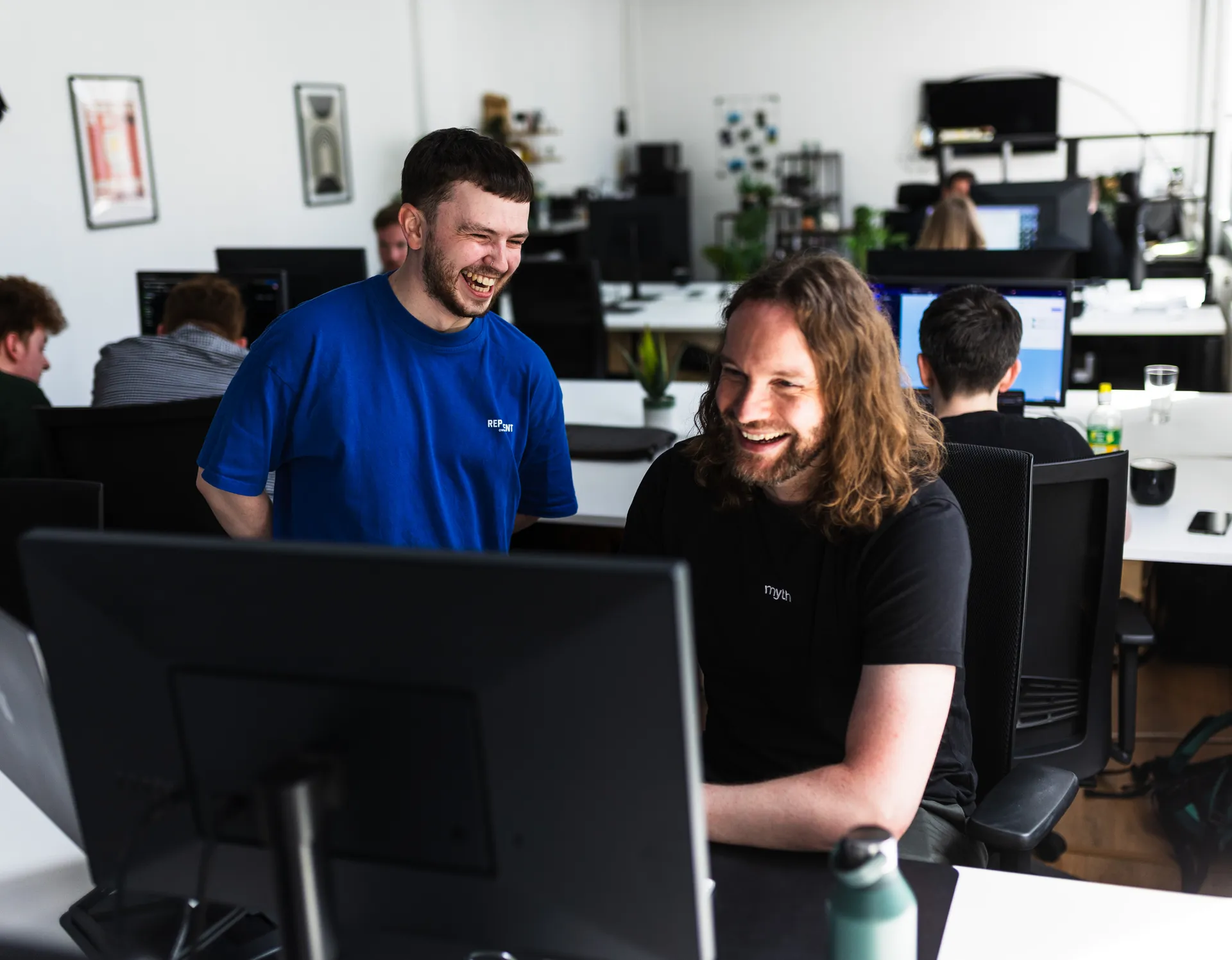 Myth Digital team at work in the studio software development partner